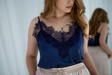Silk satin camisole with lace details.