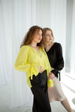 Romantic yellow blouse with ruffle sleeves