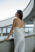 White midi silk slip dress with cowl neckline