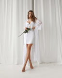 White boudoir long robe and mini silk slip dress.