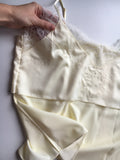 Silk pajama set. Camisole lace trim and sleep wrap shorts with side slits.